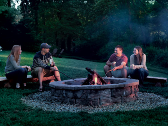 Friends gathered around a fire pit